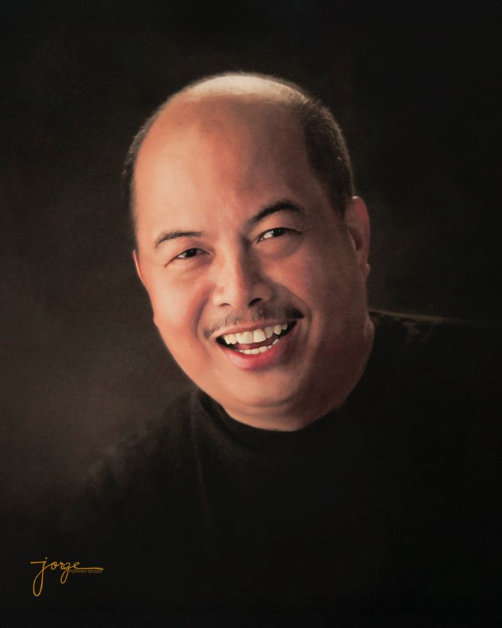 Jorge, the studio&rsquo;s founder, photographed in his own studio against a dark backdrop